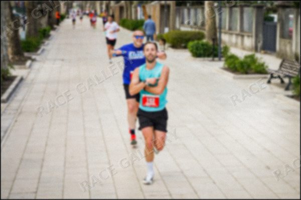 Blurred photo preview — click to enlarge