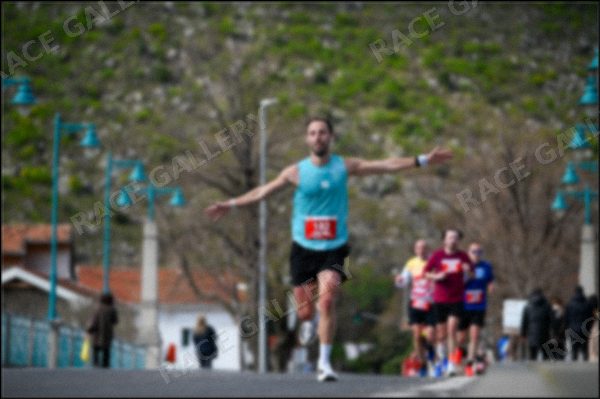 Blurred photo preview — click to enlarge